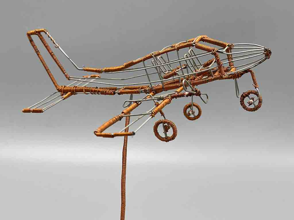African Recycled Copper Wire Toy Airplane in Flight - Niger