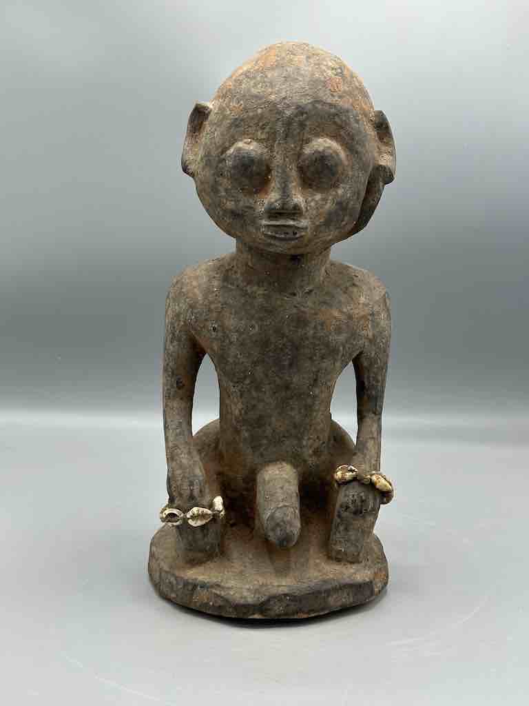 Short kneeling Yoruba male fetish figure - Benin