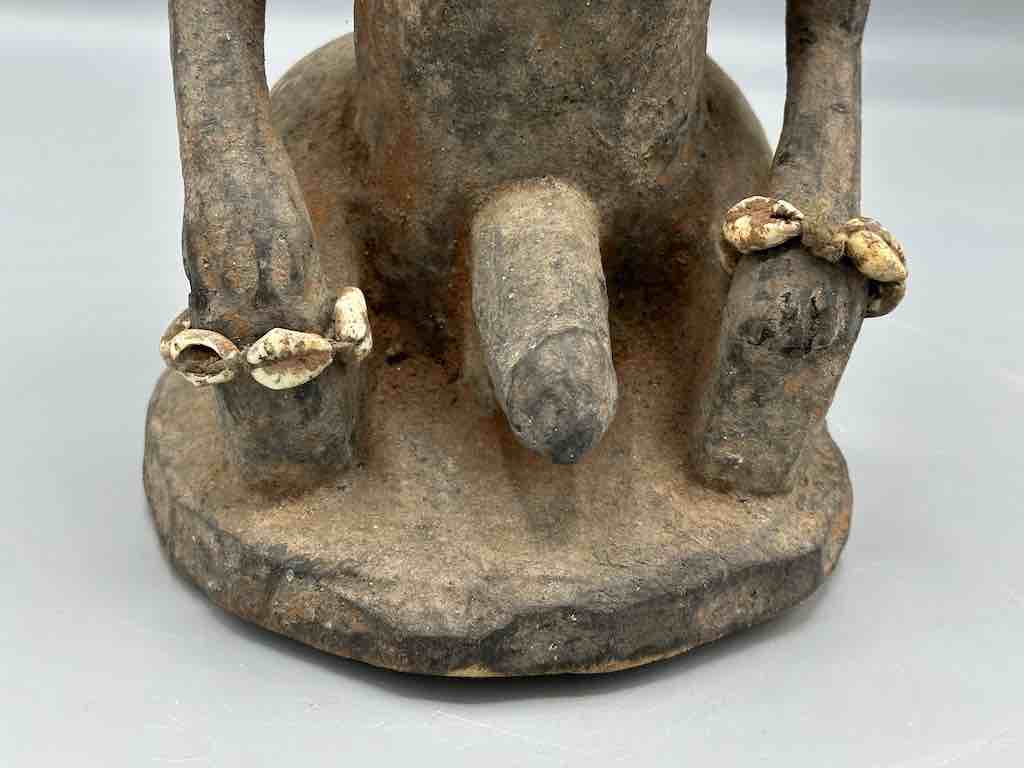 Short kneeling Yoruba male fetish figure - Benin