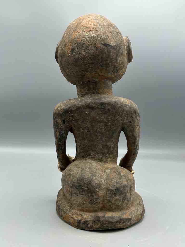 Short kneeling Yoruba male fetish figure - Benin