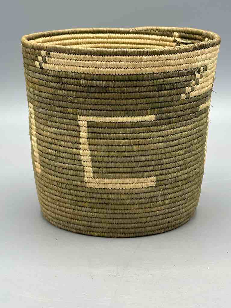 Earth tone checkerboard cylinder tightest weave Batwa basket