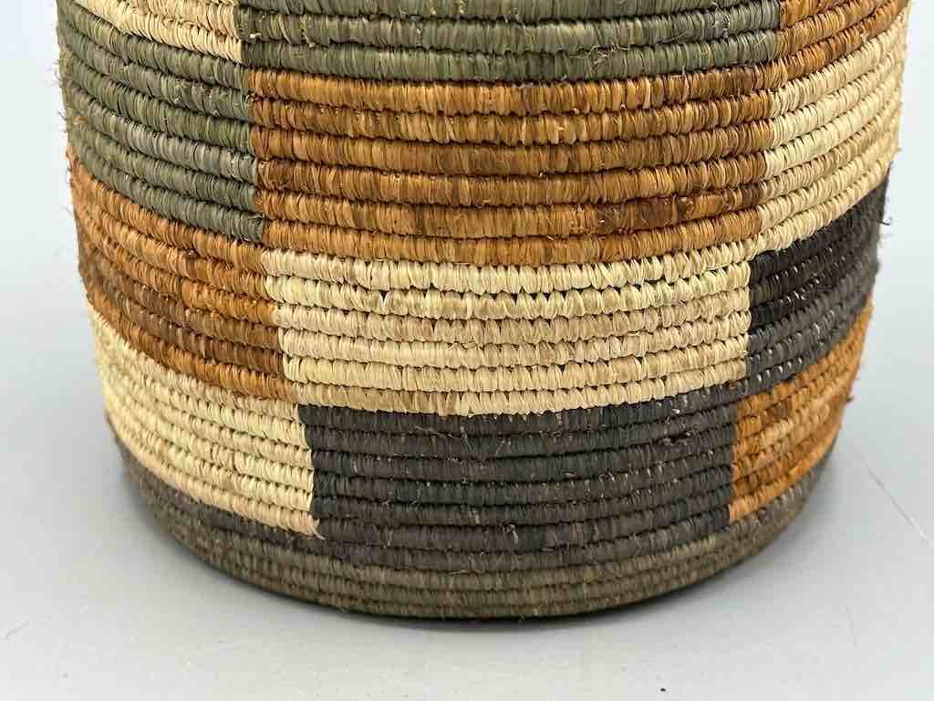 Earth tone checkerboard cylinder tightest weave Batwa basket