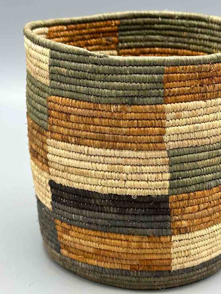 Earth tone checkerboard cylinder tightest weave Batwa basket