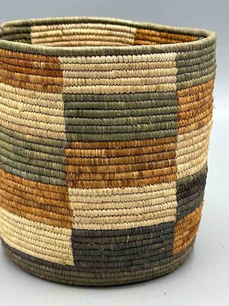 Earth tone checkerboard cylinder tightest weave Batwa basket