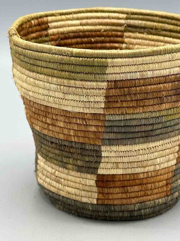 Earth tone checkerboard cylinder tightest weave Batwa basket