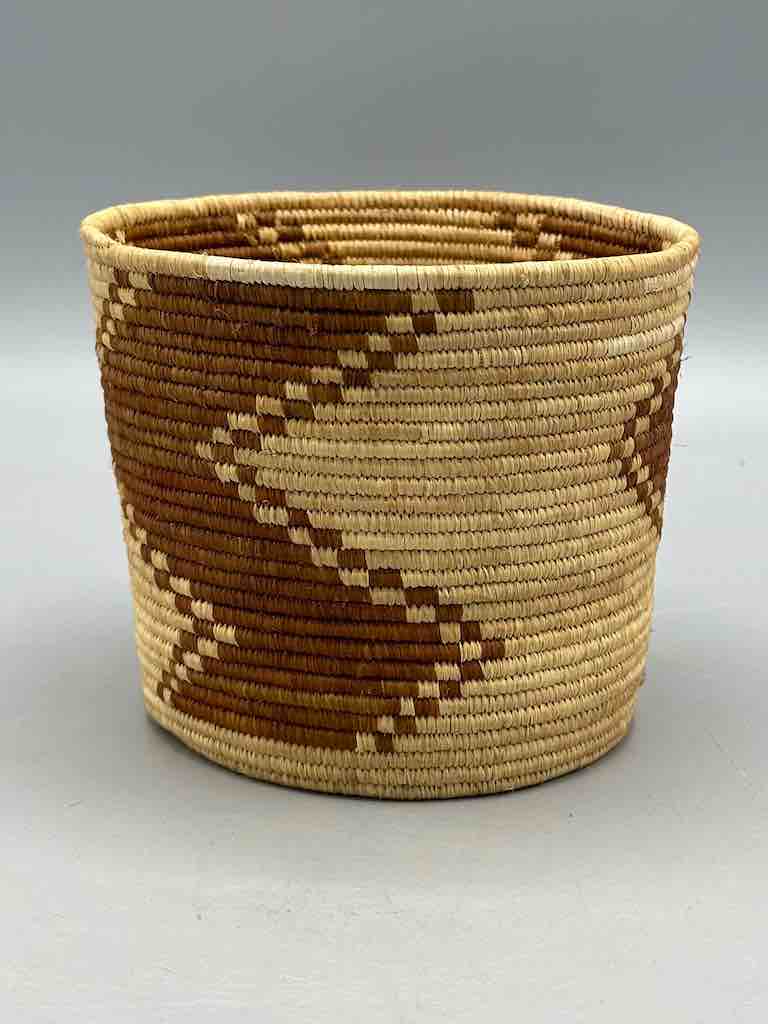 Brown zigzag cylinder tightest weave Batwa basket