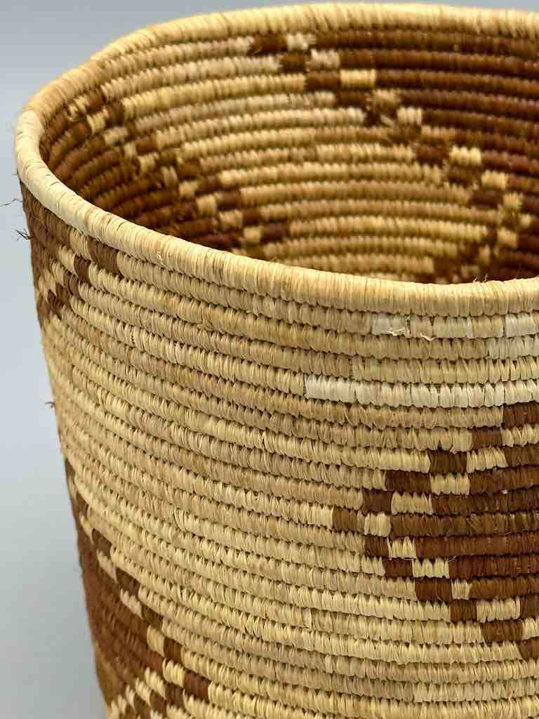Brown zigzag cylinder tightest weave Batwa basket