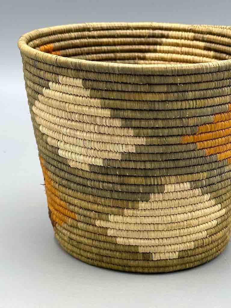Olive with diamond design cylinder tightest weave Batwa basket