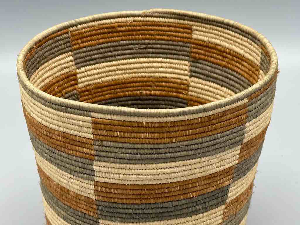 Earth tone checkerboard cylinder tightest weave Batwa basket