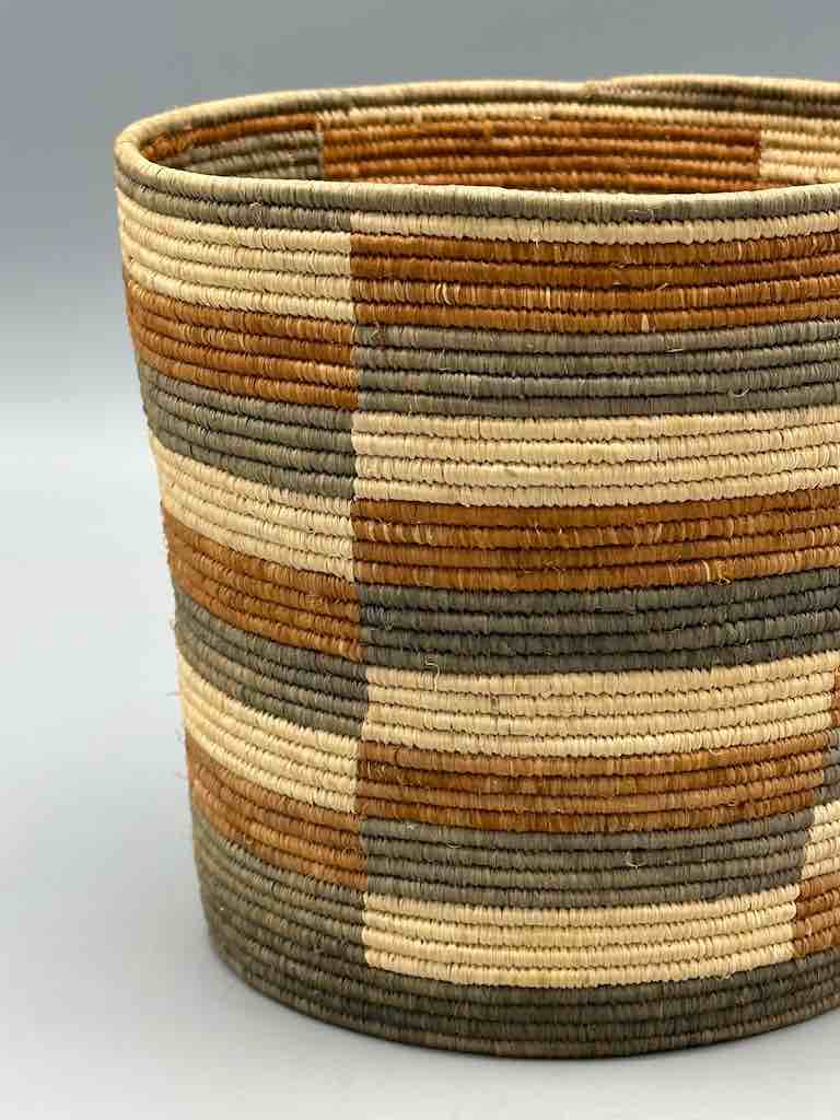 Earth tone checkerboard cylinder tightest weave Batwa basket