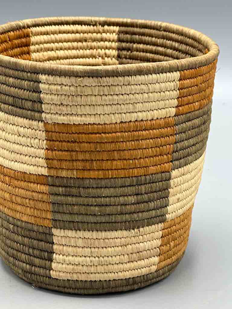 Earth tone checkerboard cylinder tightest weave Batwa basket