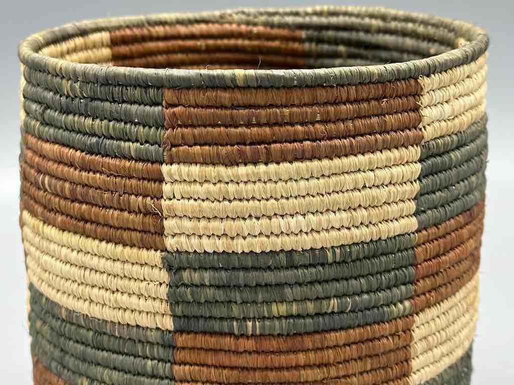 Earth tone checkerboard cylinder tightest weave Batwa basket