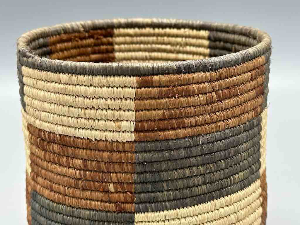 Earth tone checkerboard cylinder tightest weave Batwa basket