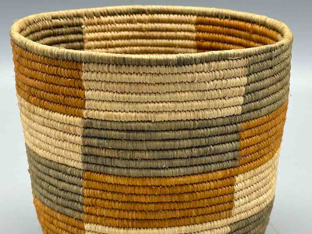 Earth tone checkerboard cylinder tightest weave Batwa basket