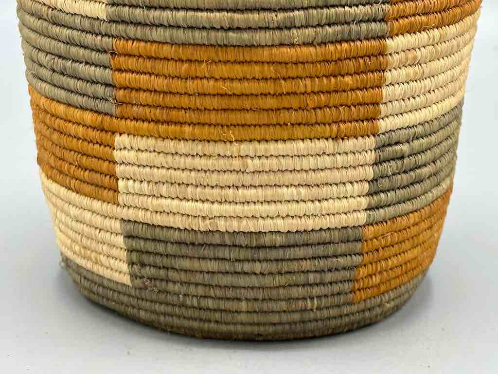 Earth tone checkerboard cylinder tightest weave Batwa basket