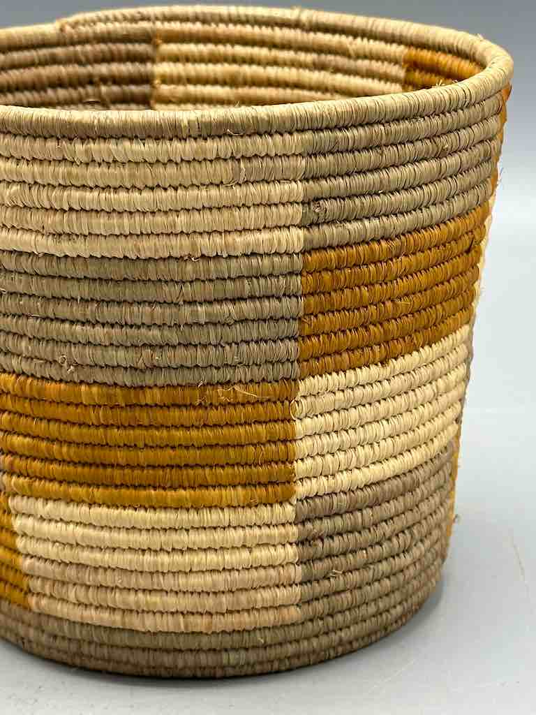 Earth tone checkerboard cylinder tightest weave Batwa basket