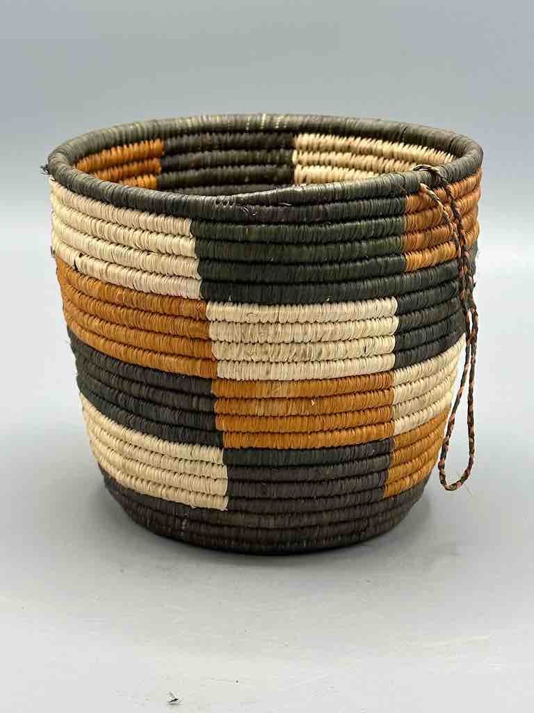 Earth tone checkerboard cylinder tightest weave Batwa basket