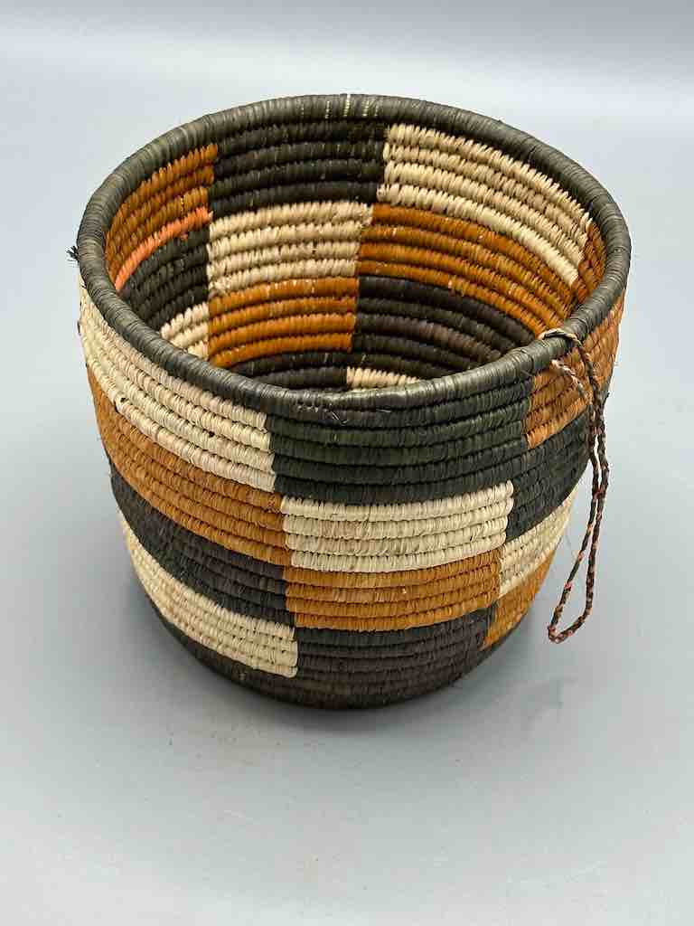 Earth tone checkerboard cylinder tightest weave Batwa basket