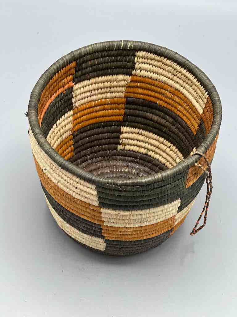 Earth tone checkerboard cylinder tightest weave Batwa basket
