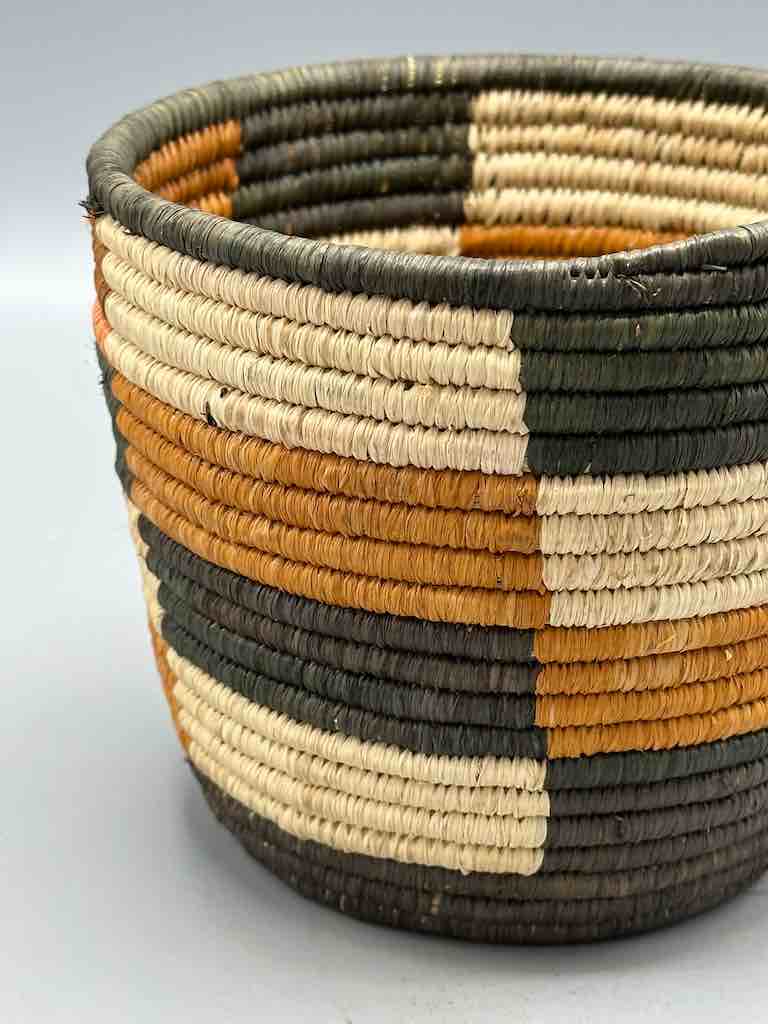 Earth tone checkerboard cylinder tightest weave Batwa basket