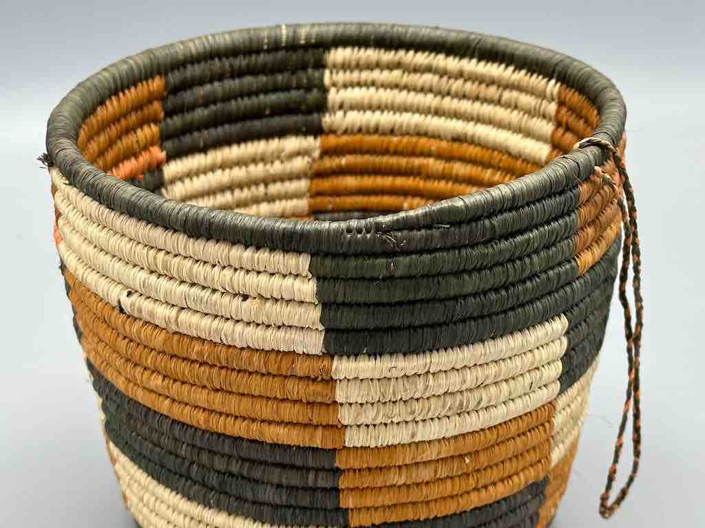 Earth tone checkerboard cylinder tightest weave Batwa basket