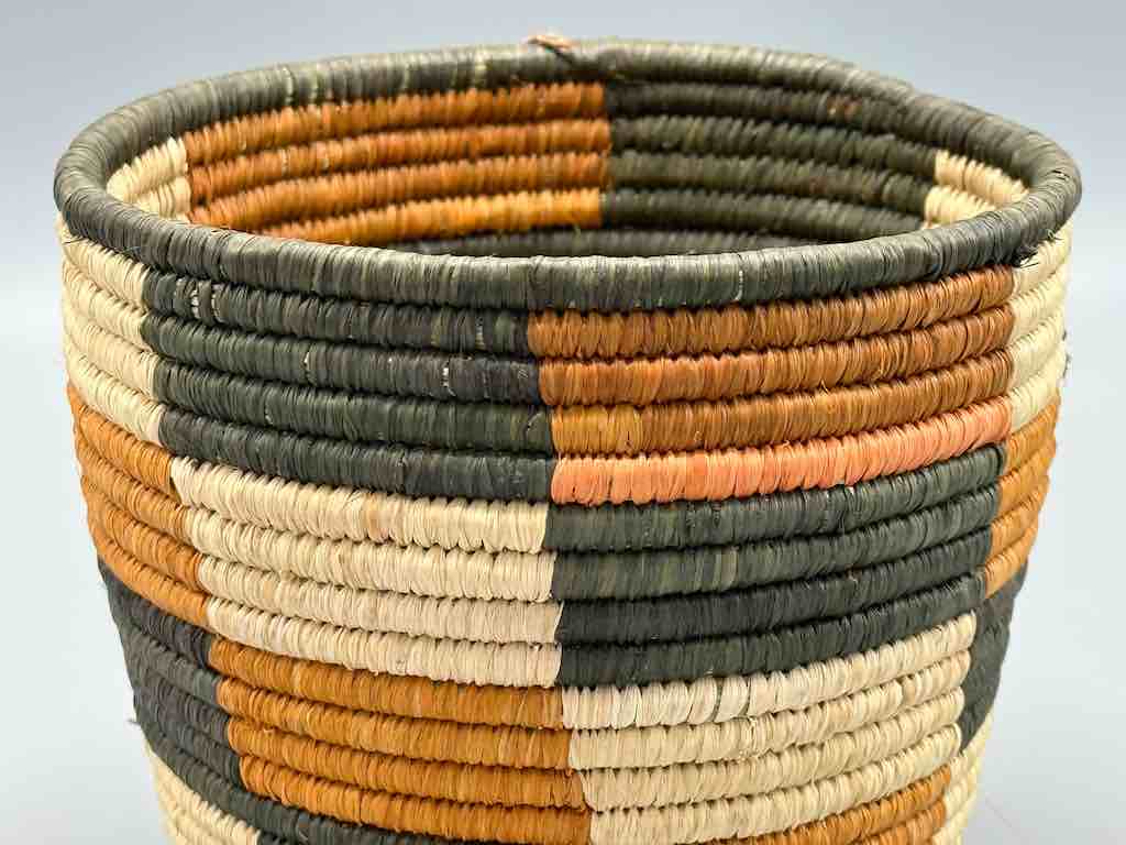 Earth tone checkerboard cylinder tightest weave Batwa basket