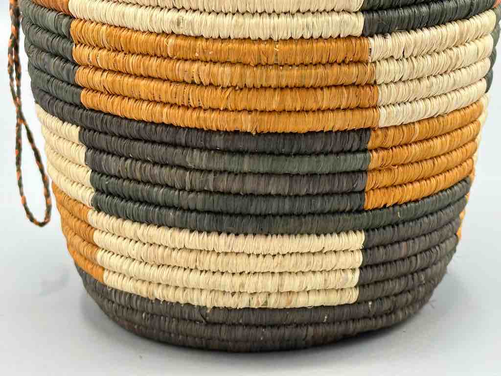 Earth tone checkerboard cylinder tightest weave Batwa basket