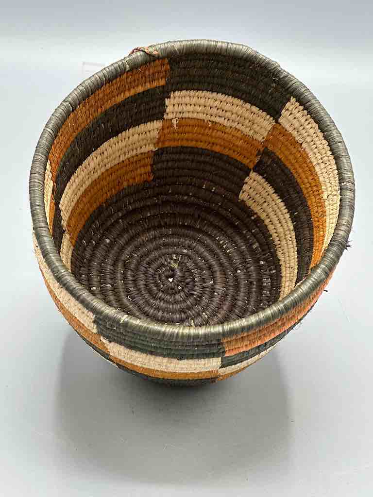 Earth tone checkerboard cylinder tightest weave Batwa basket