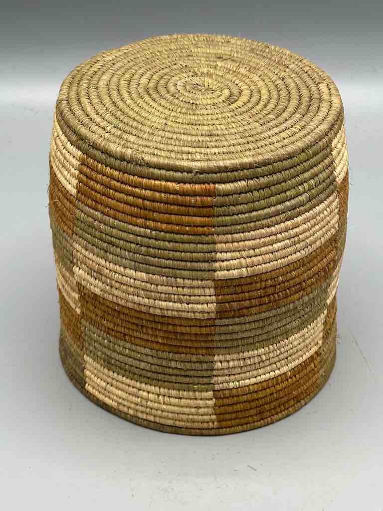 Earth tone checkerboard cylinder tightest weave Batwa basket