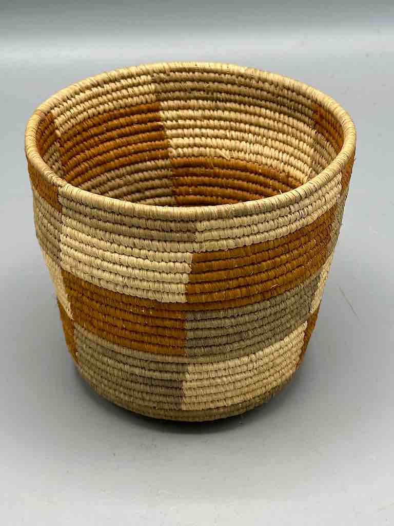Earth tone checkerboard cylinder tightest weave Batwa basket