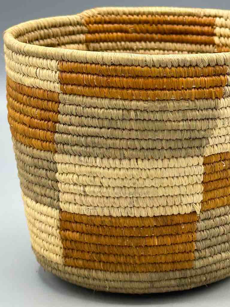 Earth tone checkerboard cylinder tightest weave Batwa basket