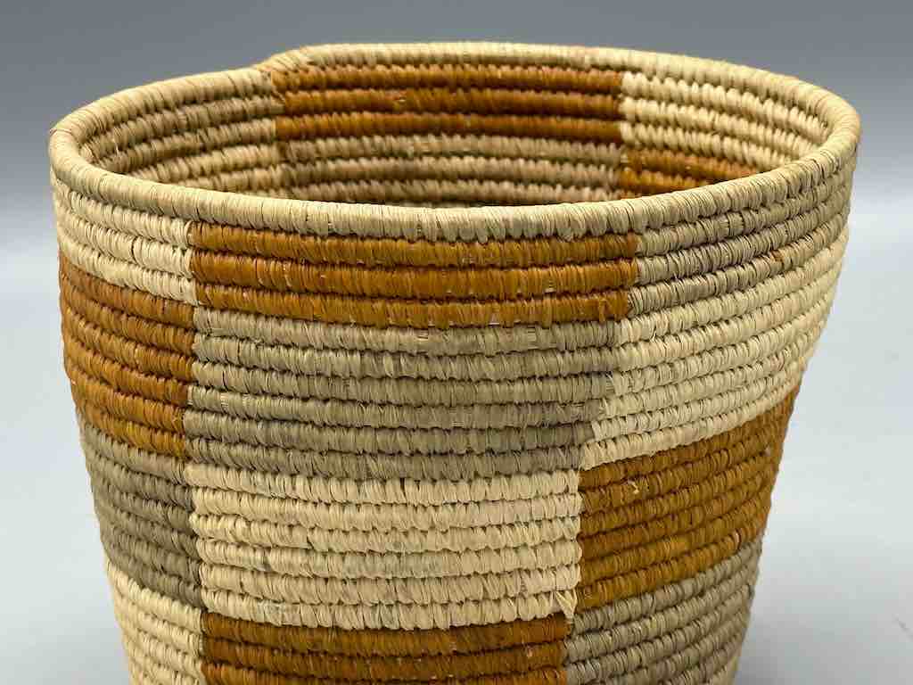 Earth tone checkerboard cylinder tightest weave Batwa basket