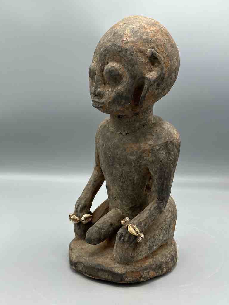 Short kneeling Yoruba male fetish figure - Benin