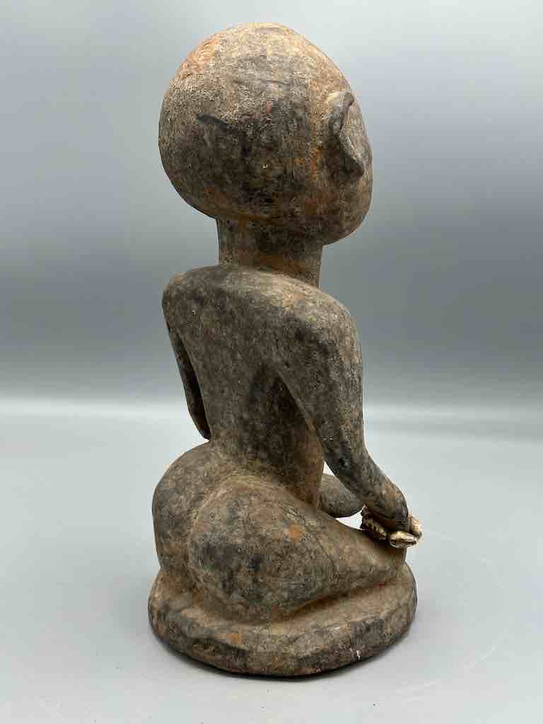 Short kneeling Yoruba male fetish figure - Benin