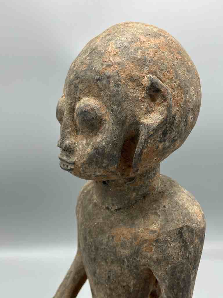 Short kneeling Yoruba male fetish figure - Benin