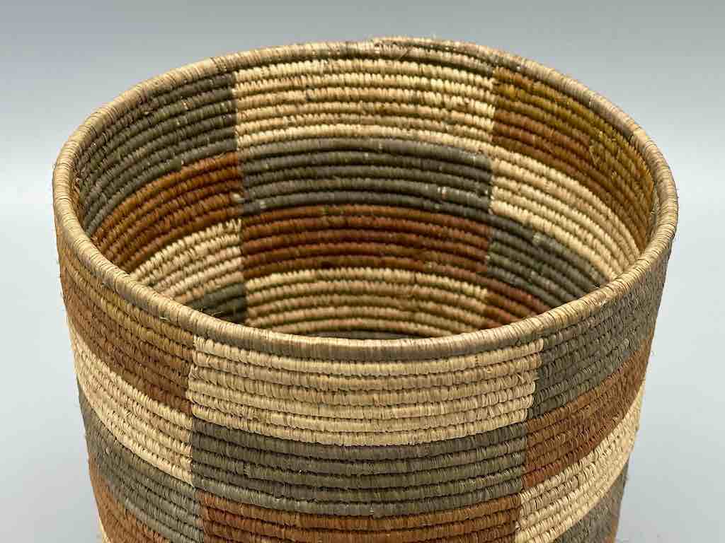 Earth tone checkerboard cylinder tightest weave Batwa basket