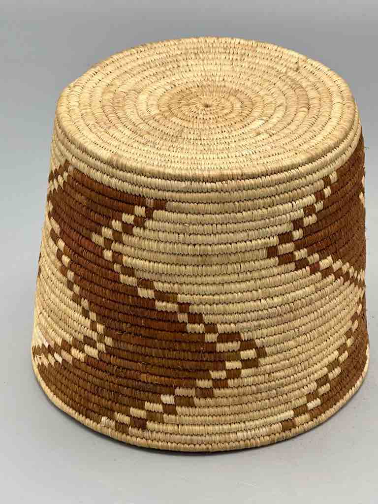 Brown zigzag cylinder tightest weave Batwa basket