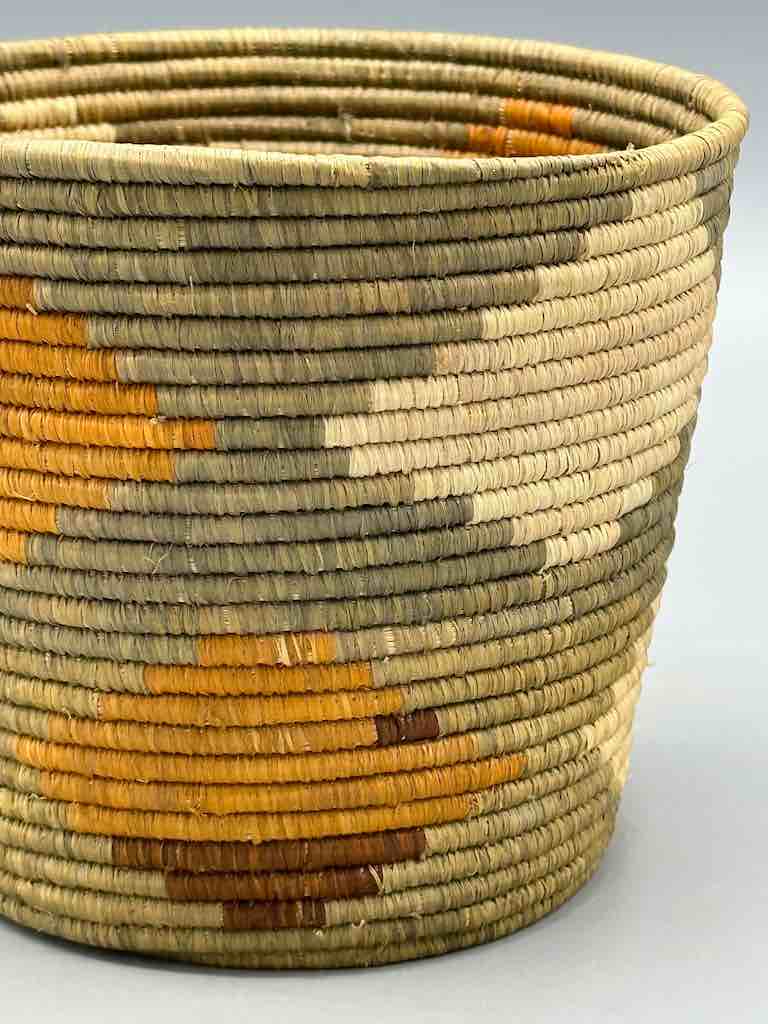 Olive with diamond design cylinder tightest weave Batwa basket