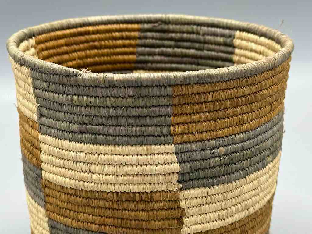 Earth tone checkerboard cylinder tightest weave Batwa basket