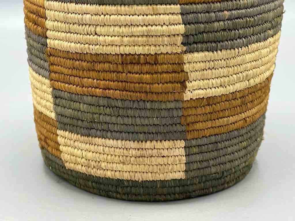 Earth tone checkerboard cylinder tightest weave Batwa basket