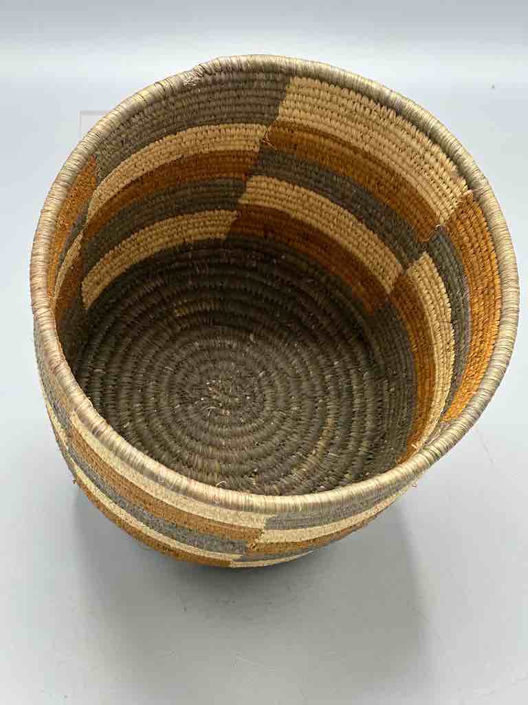 Earth tone checkerboard cylinder tightest weave Batwa basket