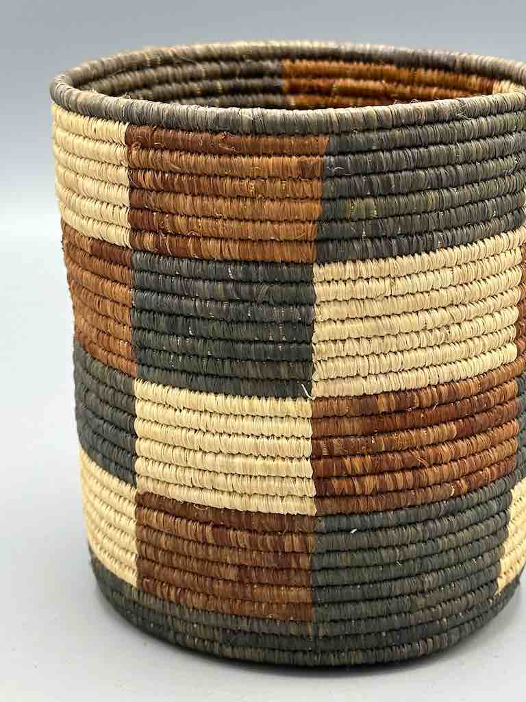 Earth tone checkerboard cylinder tightest weave Batwa basket