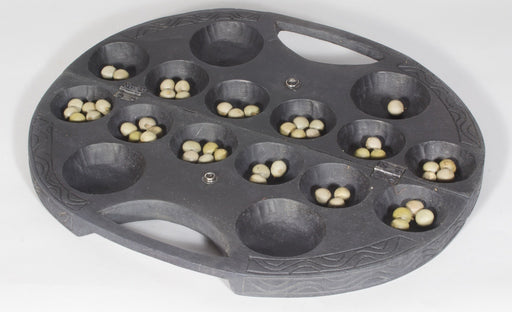 Oval portable wari game with handle