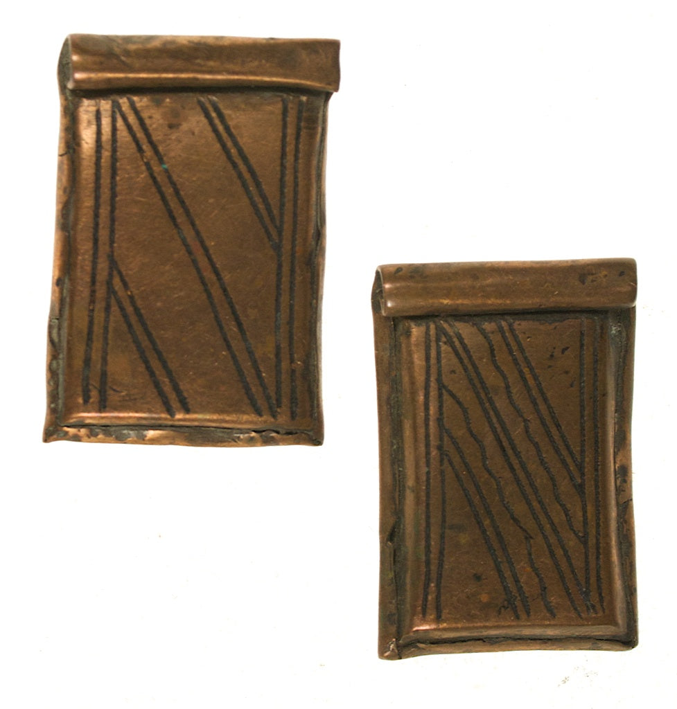 Pair of small copper amulet cases