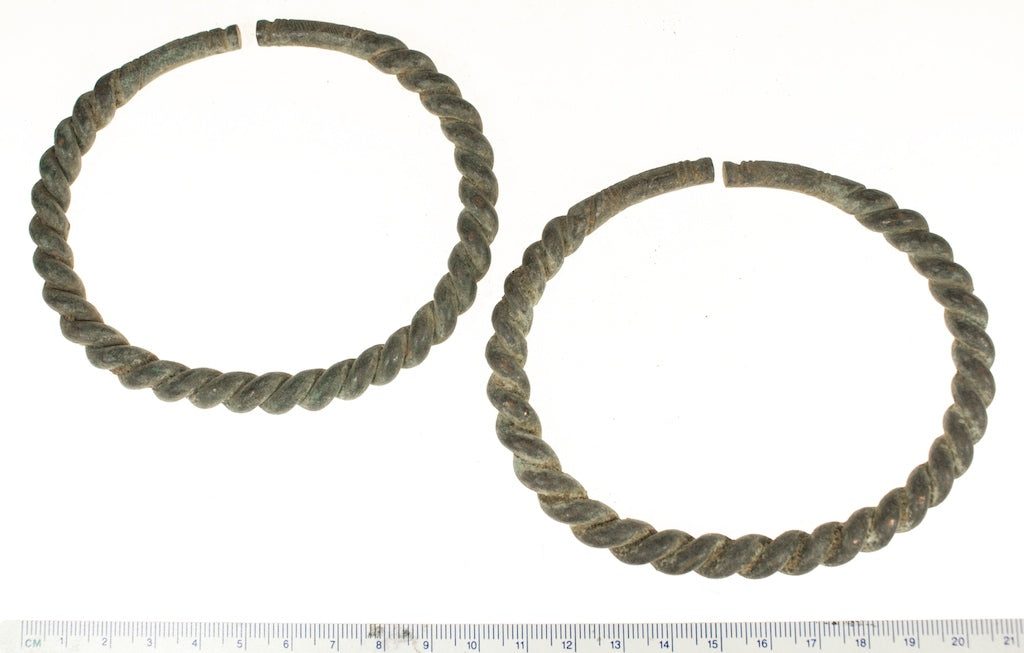 Excavated bracelet pair