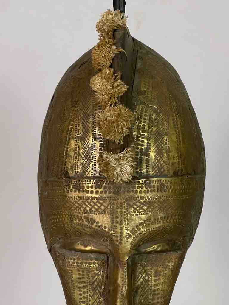 Masque africain Marka du Mali bois scuplté et feuilles de laiton Masque africain Marka du Mali bois scuplté et feuilles de laiton