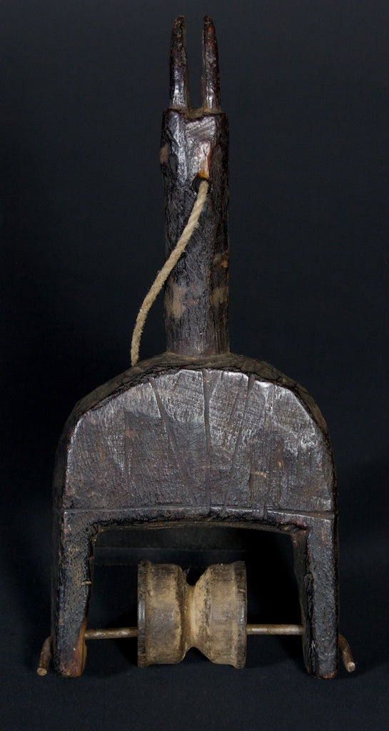 Old animal design heddle pulley